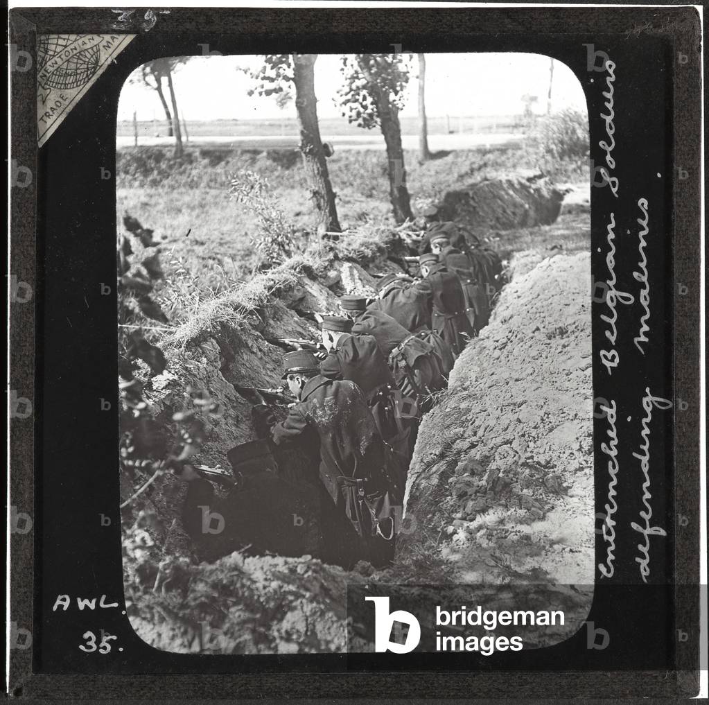 Entrenched Belgian soldiers defending Malines, 1914 (lantern slide)