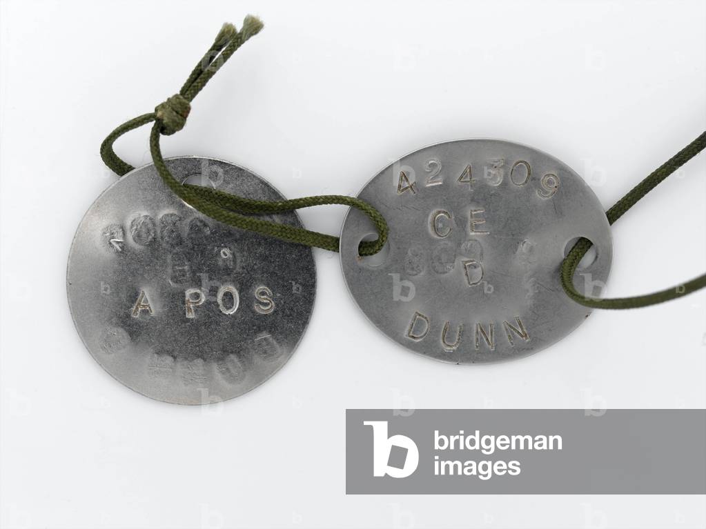 Two metal identity discs worn by Lieutenant-Colonel D Dunn, 5th Infantry Brigade, 1982 (metal)