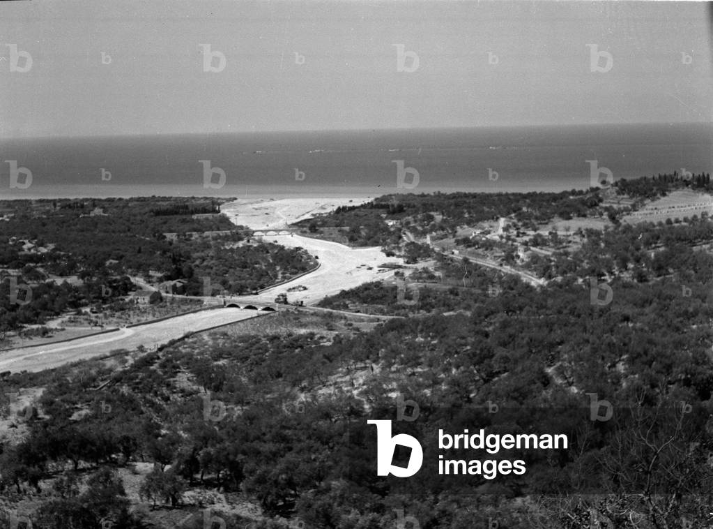 Bridges over a dry river bed near Messina, Sicily, 1943 (b/w photo)