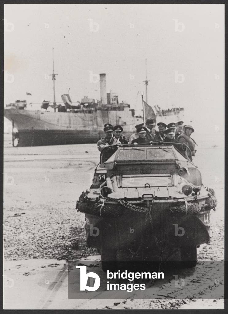 King George VI being taken ashore by a DUKW amphibious vehicle at one of the Normandy beaches, June 1944 (b/w photo)