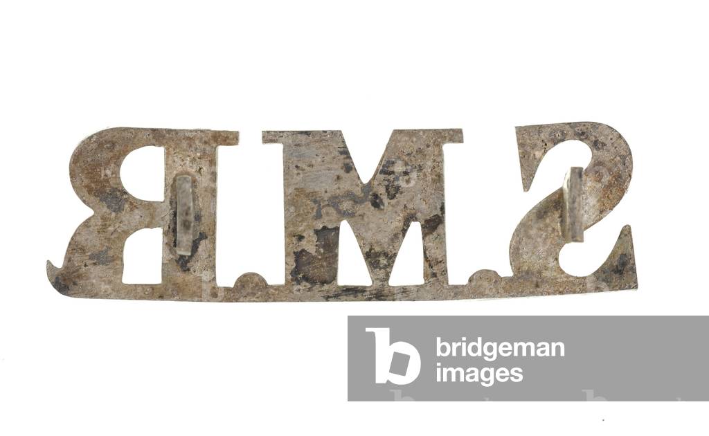 Shoulder title, Sibsagar Mounted Rifles, 1884-1891 (metal)