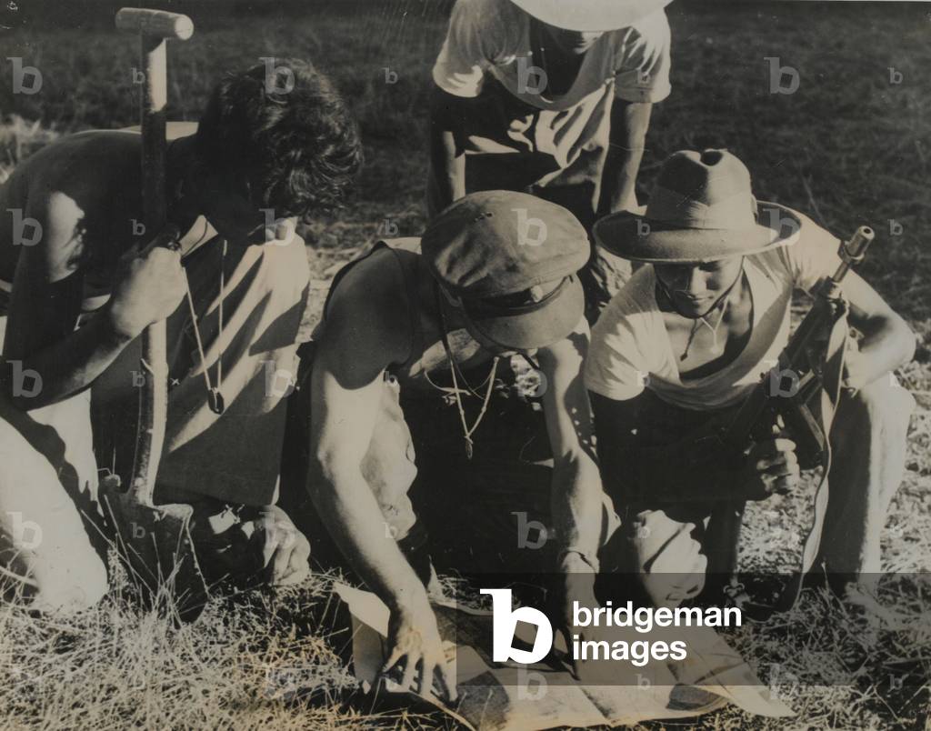 A British Commando officer confers with Burmese soldiers, Arakan Front, 1944 (b/w photo)