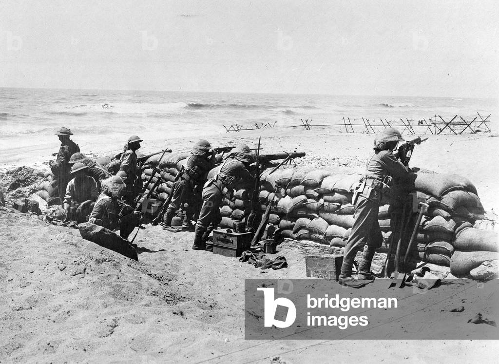 2nd Battalion, The Black Watch behind sandbag defences on the coast near Arsuf, June 1918 (b/w photo)