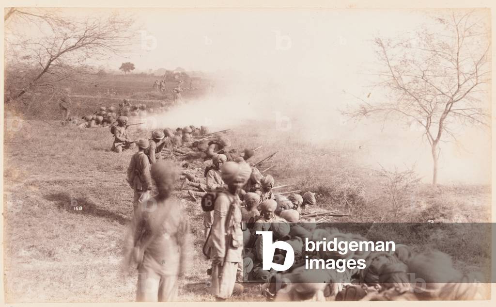Firing line of the 14th Regiment of Bengal Infantry (Ferozepore Sikhs), Delhi Camp of Exercise, 1885-1886 circa (b/w photo)