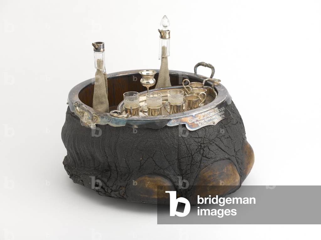 Liqueur set in a preserved elephant's foot, c.1903 (elephant's foot bound with silver)