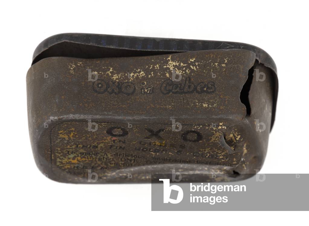 Oxo tin containing a spent bullet and a cardboard Oxo cube box, 1915 circa (tin)