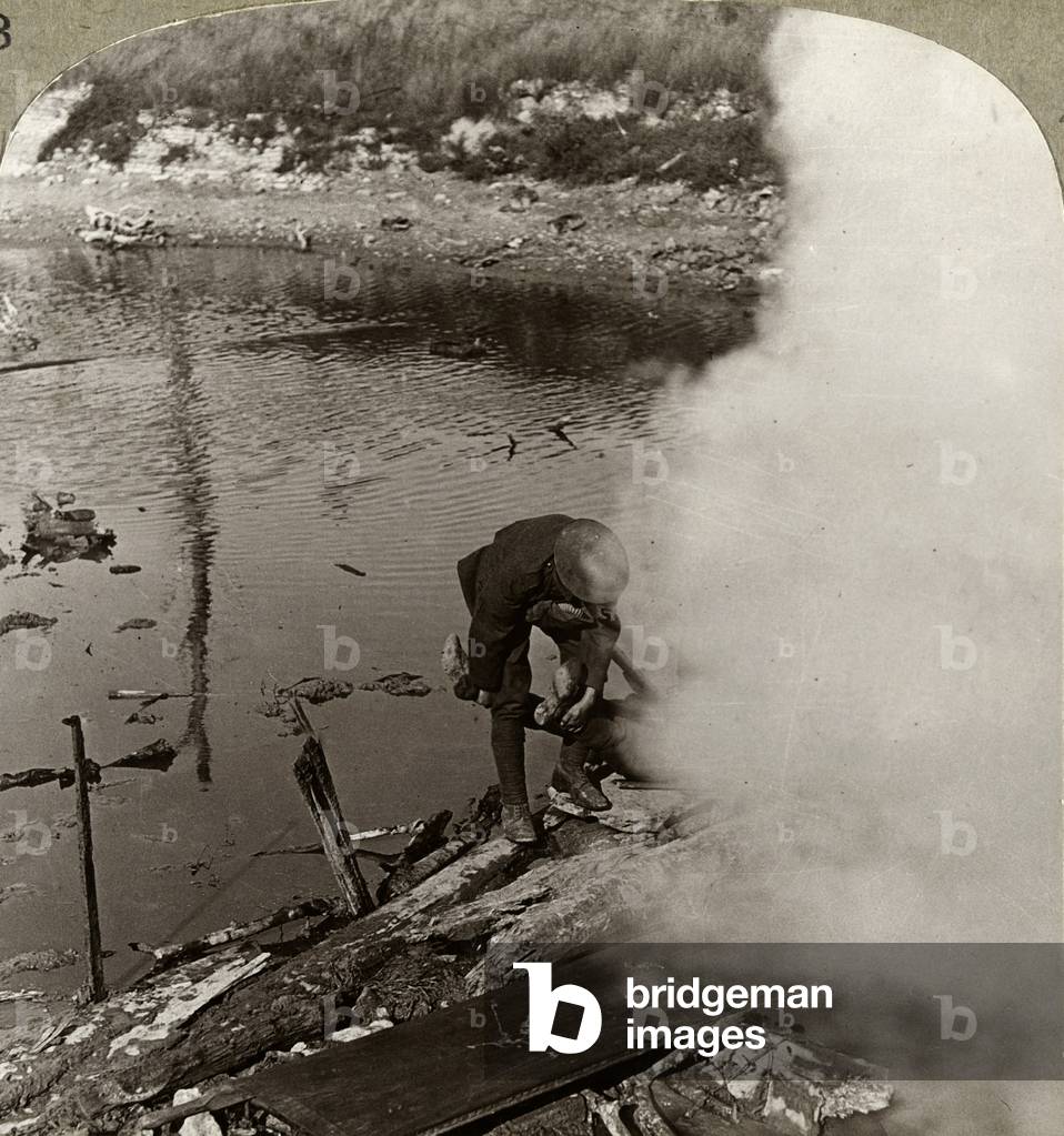 Stretcher bearers rescue a comrade wounded in our great push on the Somme, 1916 (b/w photo)