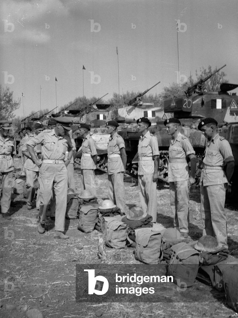 Brigadier John Currie inspecting kits of 'A' Squadron, 1943 (b/w photo)