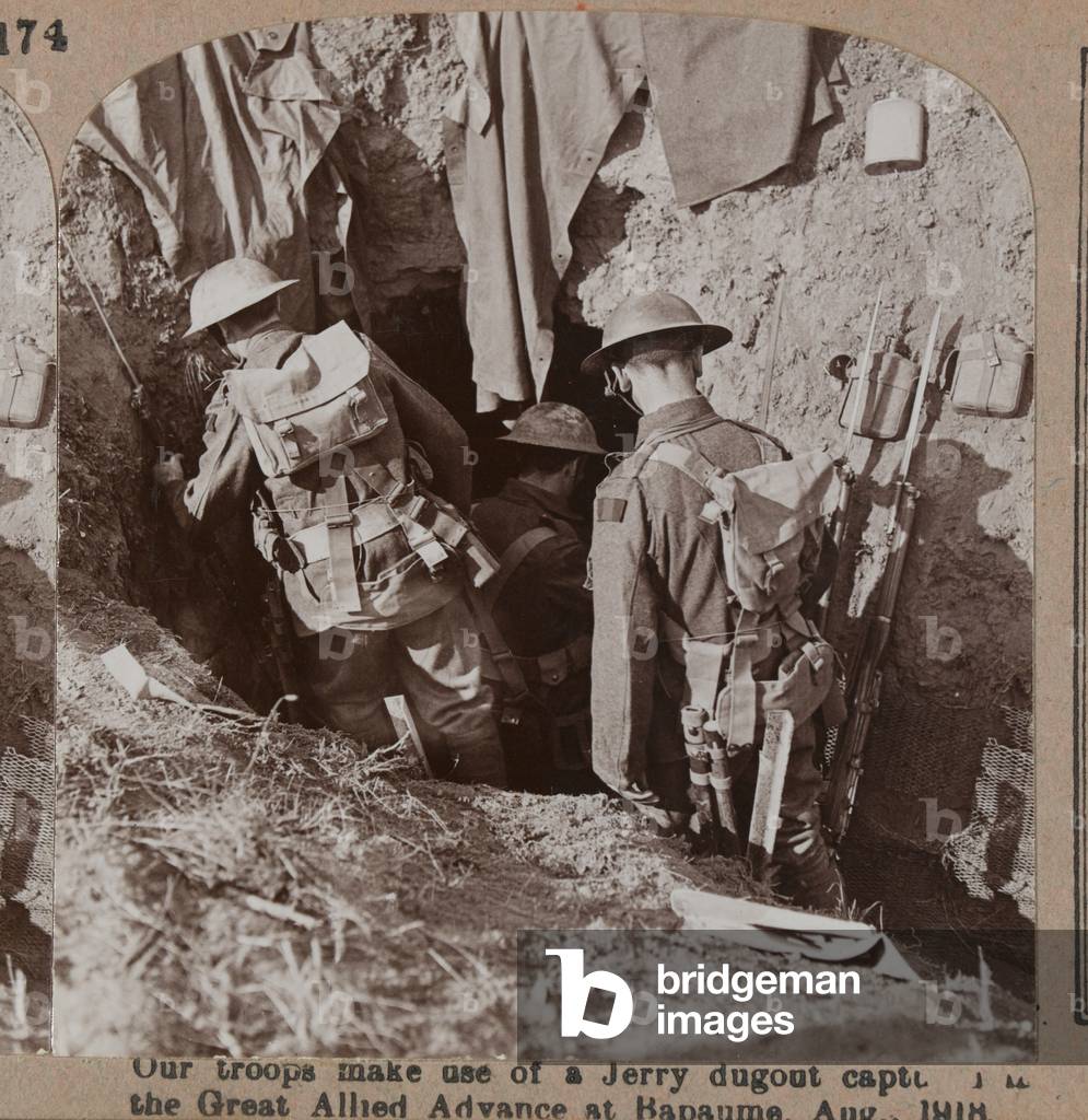 Our troops make use of a Jerry dugout captured by the Great Allied Advance at Bapaume, August 1918 (b/w photo)