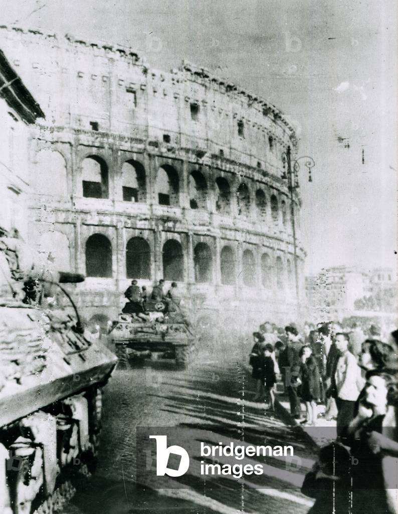 Tanks of the 5th Army pass the Colosseum as cheering Romans welcome the liberators, 4 June 1944 (b/w photo)