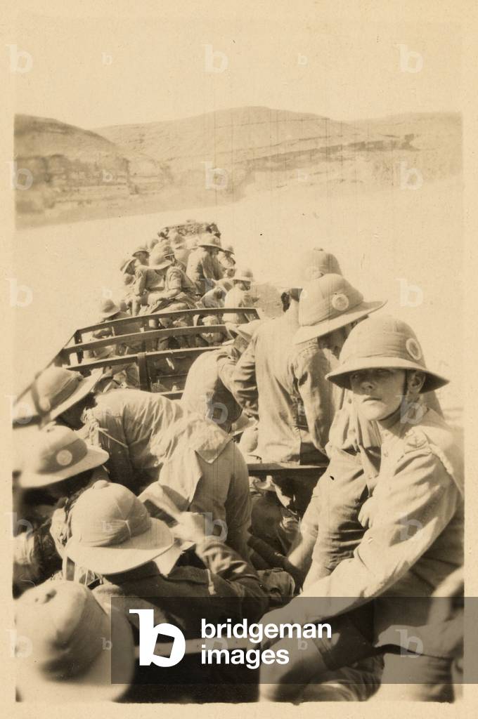British soldiers travelling by troop train on the desert railway, Sheik Nakhrur, 1917 (b/w photo)
