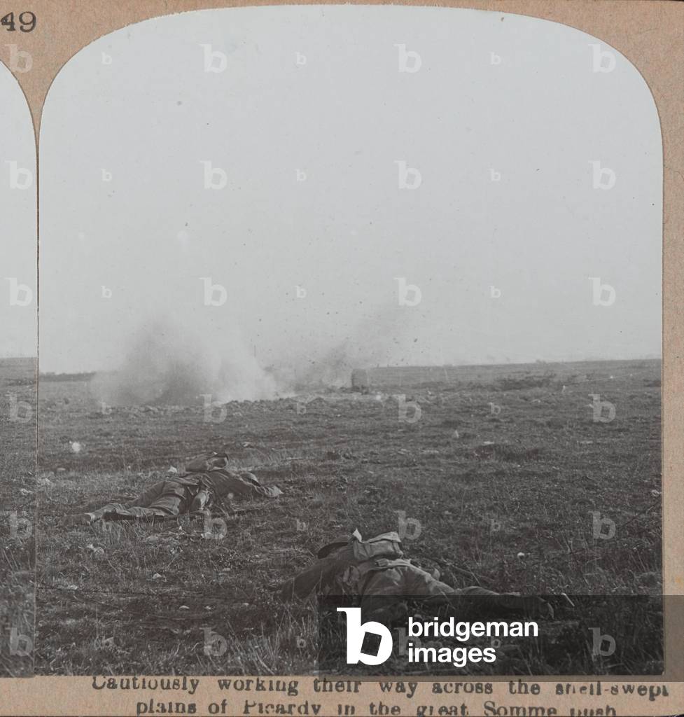 Cautiously working their way across the shell-swept plains of Picardy in the great Somme push, July 1916 (b/w photo)