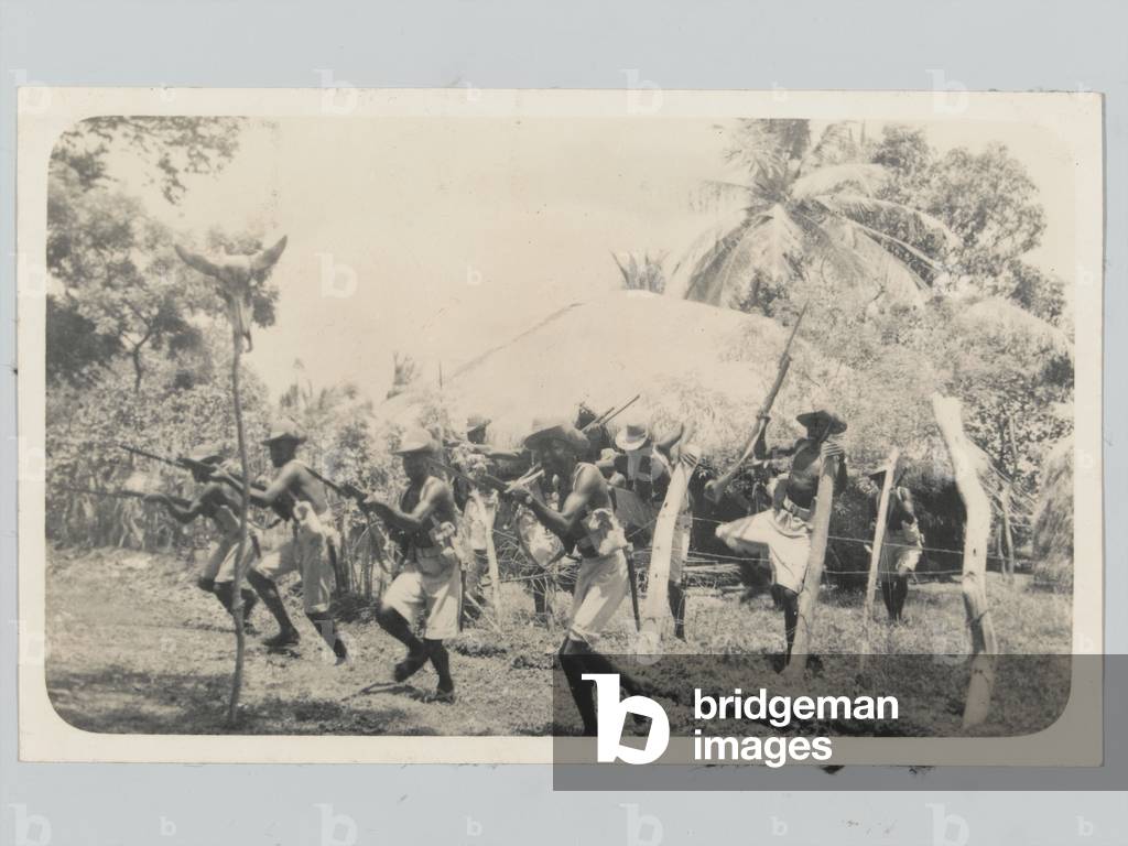 The 4th (Uganda) Battalion, Kings African Rifles, charging with bayonets during a training exercise, 1942 (b/w photo)