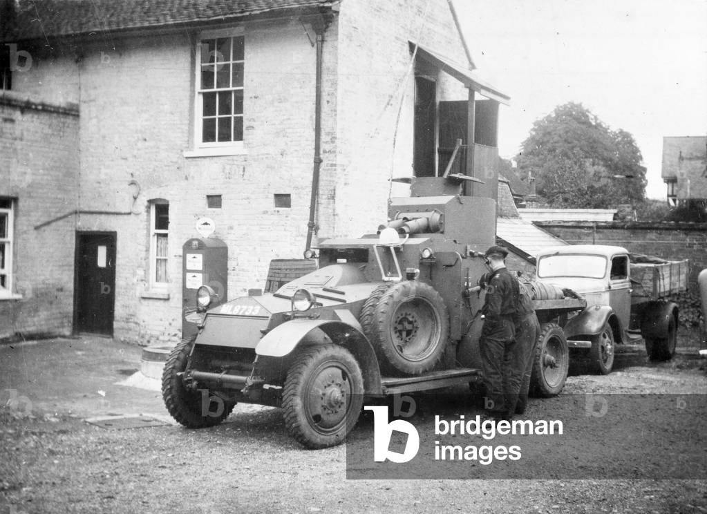 John Vaughan next to his Lanchester Armoured Car, Popham, Hampshire, 1939 circa (b/w photo)