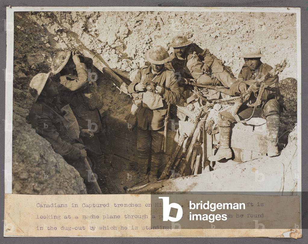 Canadians in a captured trench at Hill 70, 1917 (b/w photo)