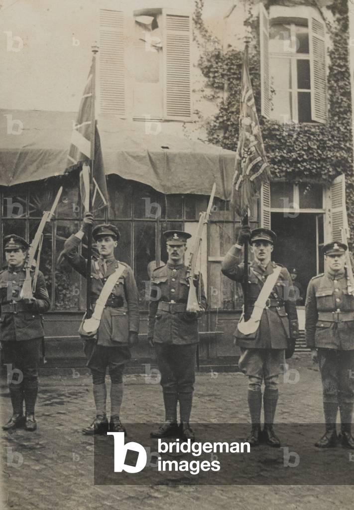 Photograph showing colour party, 2nd Bn, Royal Dublin Fusiliers, at Le Quesnoy after the armistice, 1918 (b/w photo)