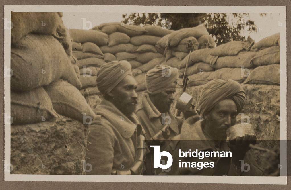 Indian soldiers in trench, 1915 (b/w photo)
