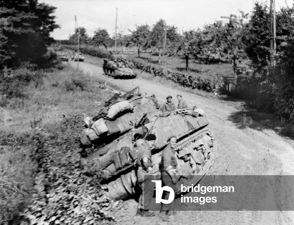 Royal Scots Greys tank ditched during the march towards Antwerp, 1944 circa (b/w photo)