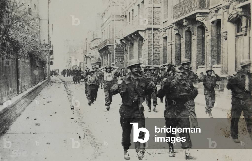 British prisoners marching through Dieppe, France, 1942 (b/w photo)