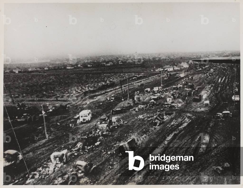 A German truck column after a raid by Soviet aircraft, February 1944 (b/w photo)