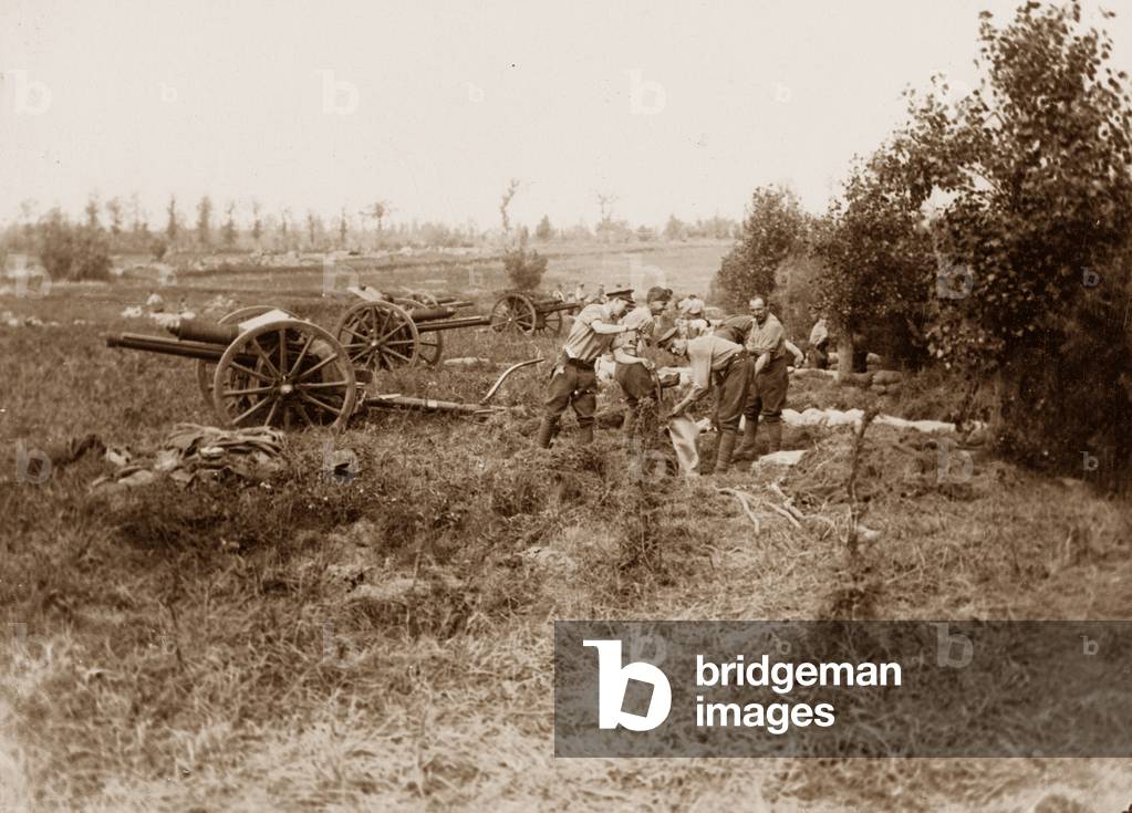 Gunners dig in on captured territory during the Battle of Messines Ridge, 1917 (b/w photo)