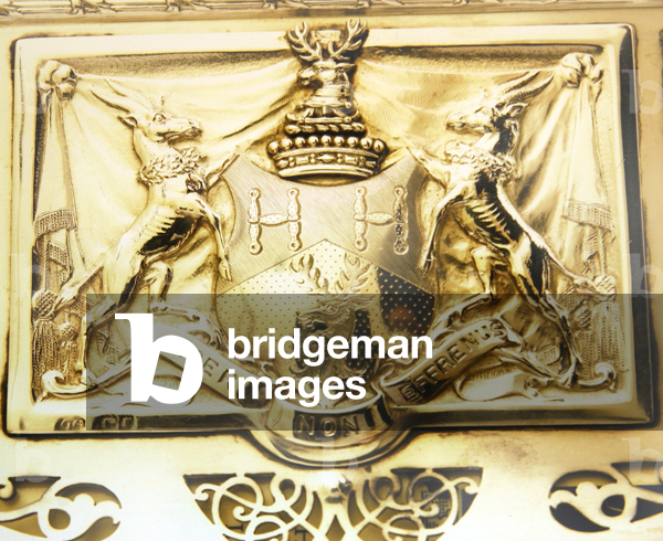 Detail of the arms of the Skinners' Company embossed on a rectangular casket, 1908 (silver)
