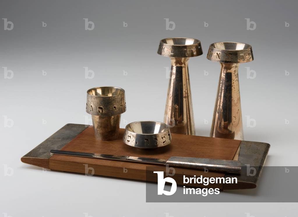 Sabbath Set: two candlesticks, Kiddush cup, salt dish, bread knife, Hallah tray, designed 1963 (Knife: steel, walnut, and silver; Candlesticks, cup, and dish: silver: fabricated and pierced; Tray: walnut and silver)