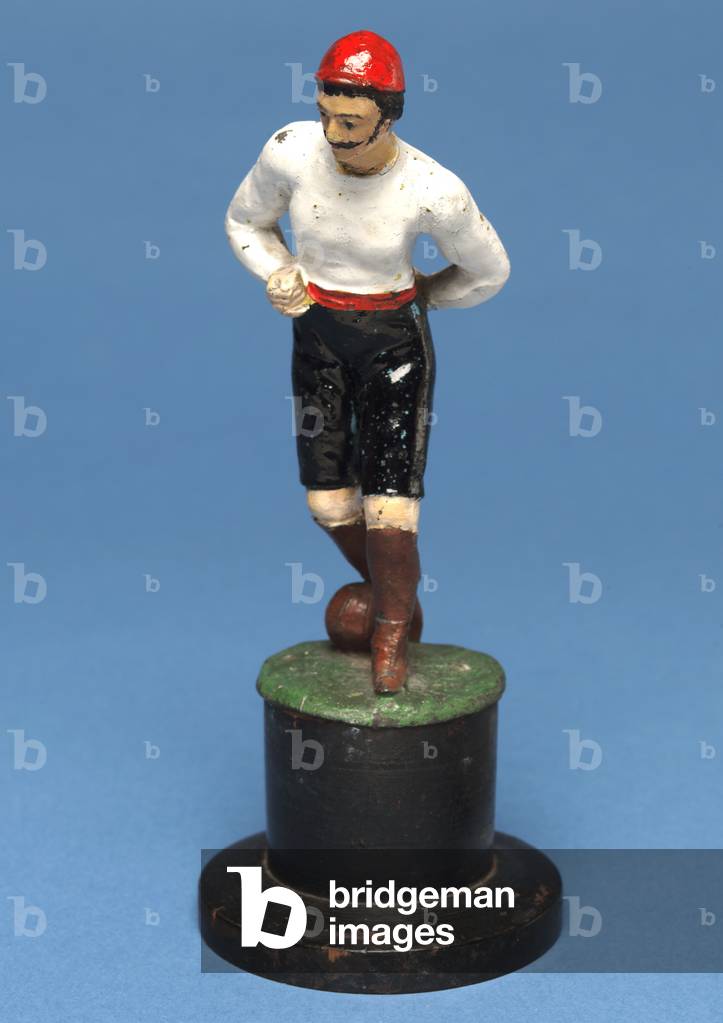 Footballer with the ball at his feet (hand-painted metal)