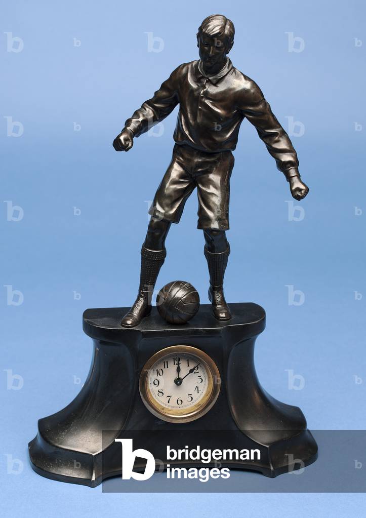 Footballer, part of a clock set (painted spelter) (see also 315474-315475 & 315477)