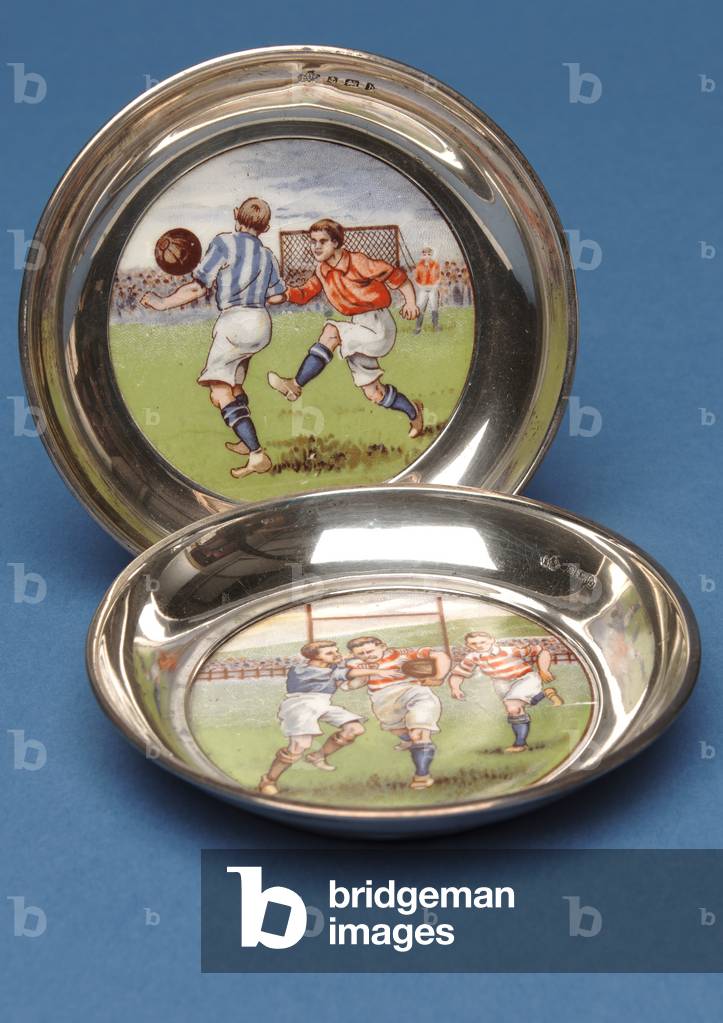 Pair of silver trays depicting rugby and football, Birmingham, 1907 (silver & enamelled porcelain)