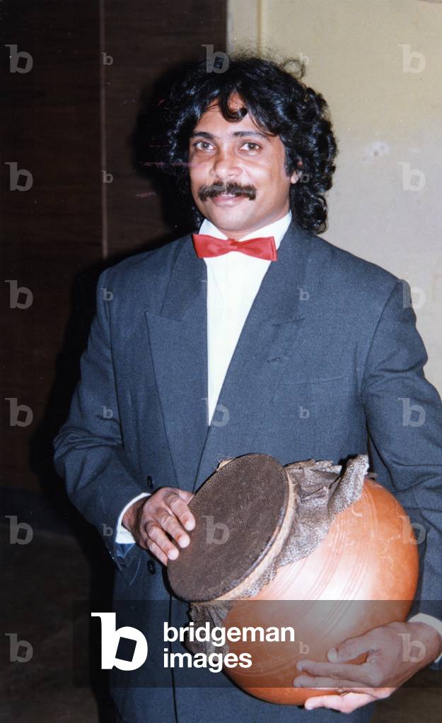 Indian drum being played