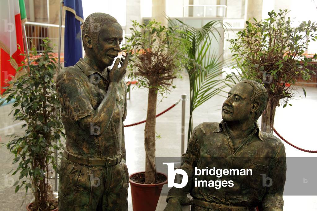 Memorial statues of Giovanni Falcone and Paolo Borsellino inside the Palace of Justice in Palermo, Sicily (photo)