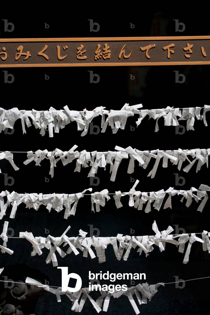 Prayers written on paper, Buddhist temple, Miya-Jima Island, Japan (photo)