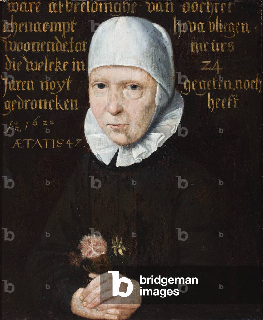 A portrait of a lady in a black and white cap holding a nosegay, 1622 (oil on panel)