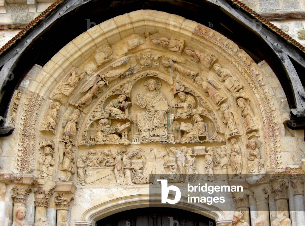 Tympanum from the north door depicting Christ with the four apostles, 12th century (photo)