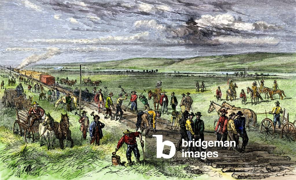 Immigrants and other workers laying the rails of the Nebraska Iron Chmin, 1860s. Colour engraving of the 19th century.