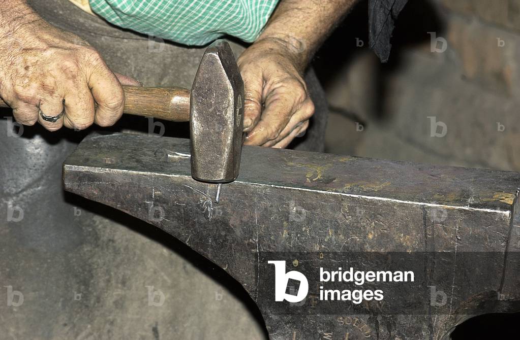 United States, State of California: Blacksmith in his Reconstitution workshop in Sutter's Fort, Sacramento