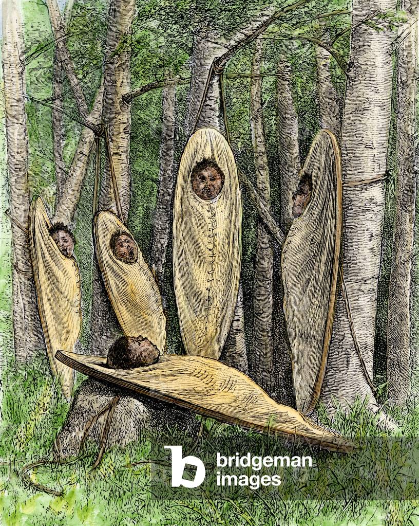 Indians of America: Group of Sioux babies in cradles. 19th century colour engraving.