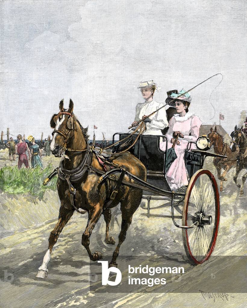 Immagine di Incisione "Elegante giovane donna alla guida di una carrozza trainata da un cavallo sulla spiaggia