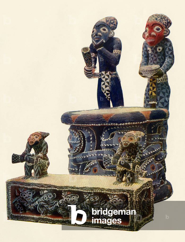 African Art: A tribal leader from Cameroon in ebene, ivory and painting. Reproduction of the object.