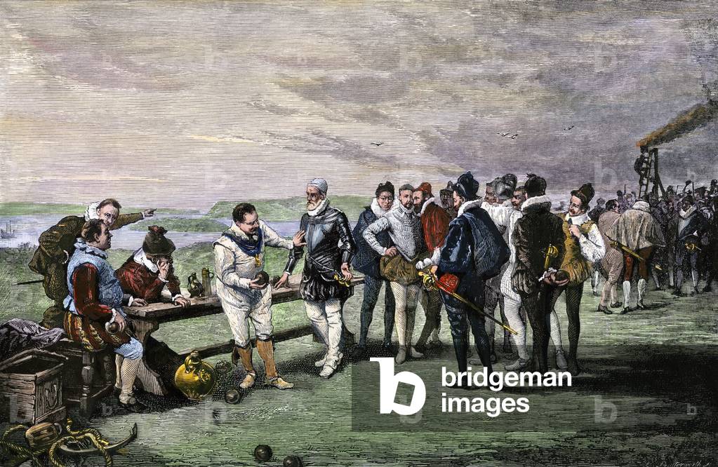 British Navy officers playing a ball game on Plymouth Hoe, waiting for the approach of the terrible Spanish Armada, 1588. Among them, the English navigator Sir Francis Drake, (1540-1596). Illustration of the anecdote that Drake calmly finished his game as the fleet of the “Invincible Armada” of Spain approached the English coast. Coloured water, 19th century.