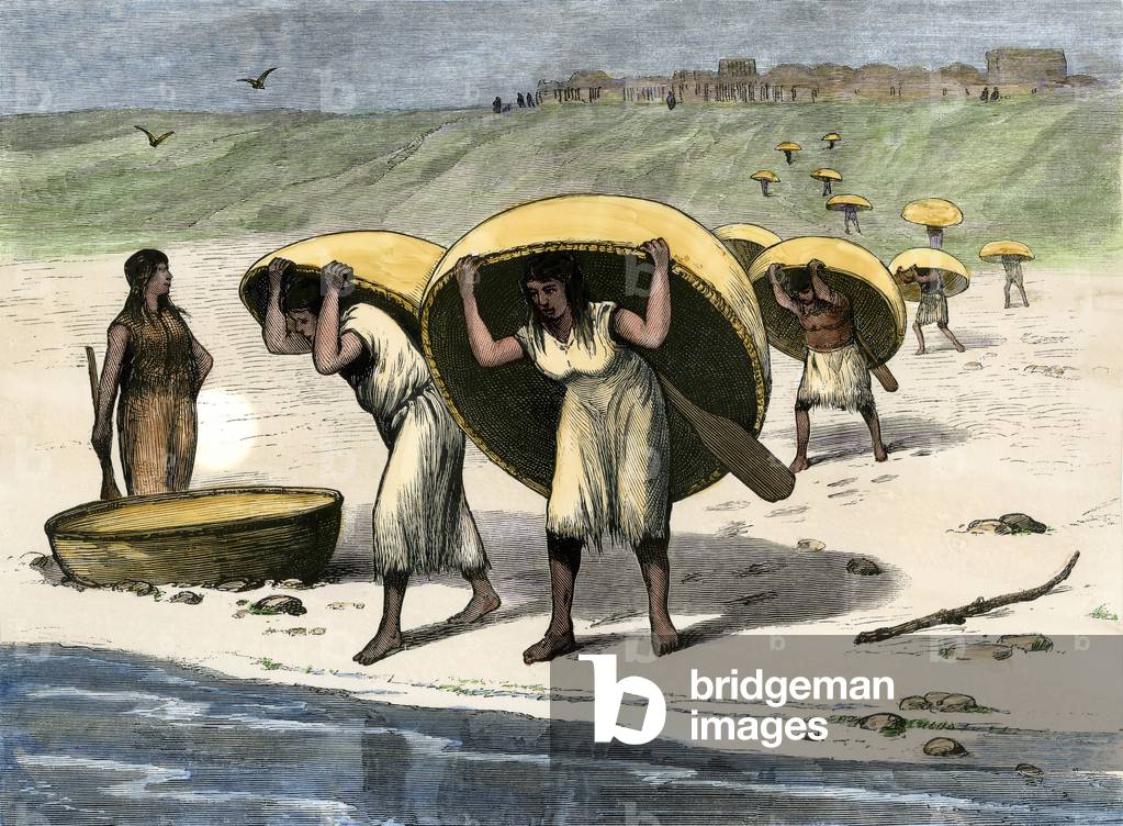 Mandan Indian women carrying their round canoe to the Missouri River, behind them, Fort Berthold of the Indian Reserve (North Dakota, USA), circa 1870 - Hand-colored woodcut of a 19th-century illustration