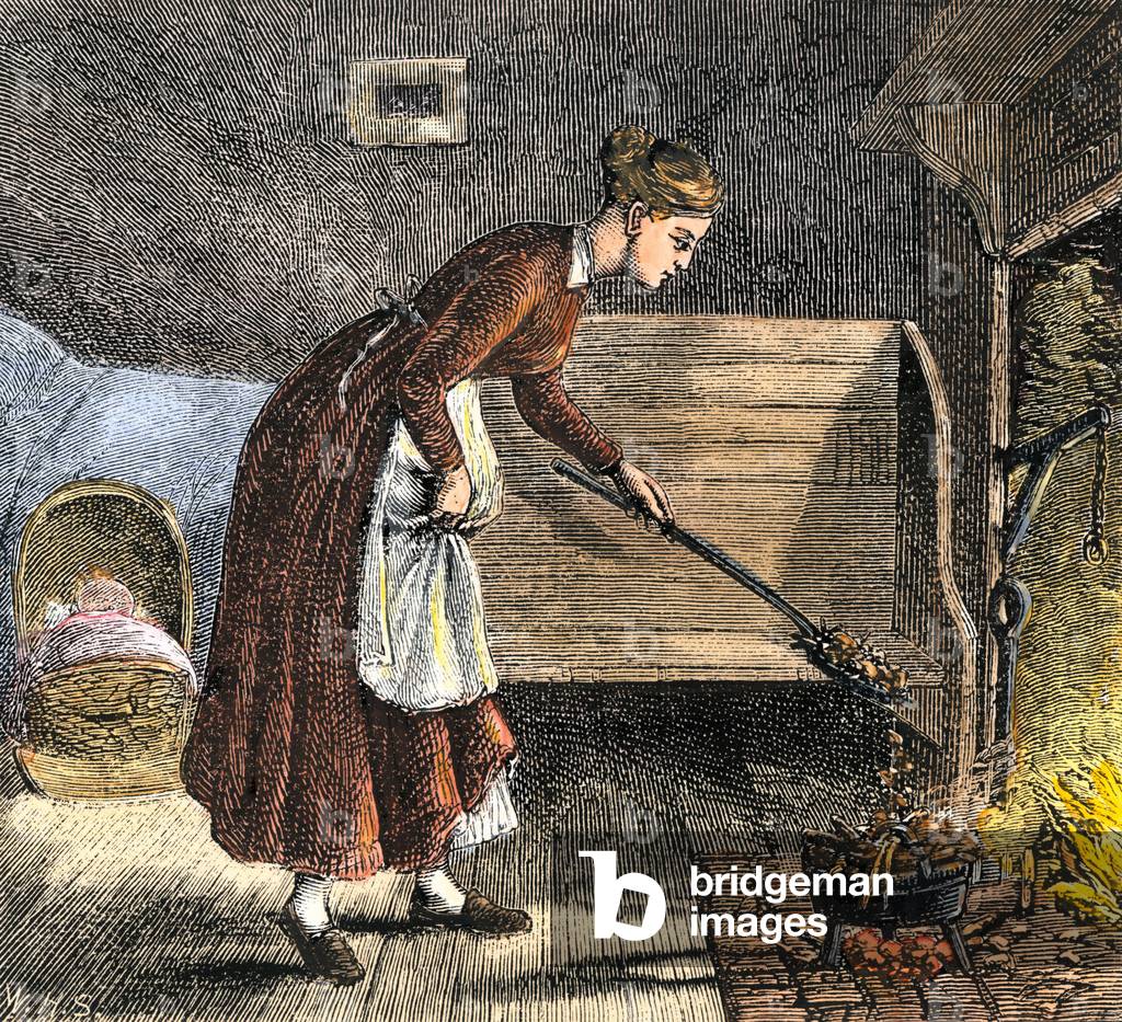 Population of America: mother cooking in a kettle in front of the fireplace, 18th century. Colouring engraving of the 19th century.