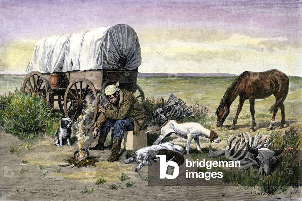 History of the settlers and the conquete of the West: American pioneers. Man with dogs camping near his diligeance in the Great Plains. Colourful engraving of the 19th century.