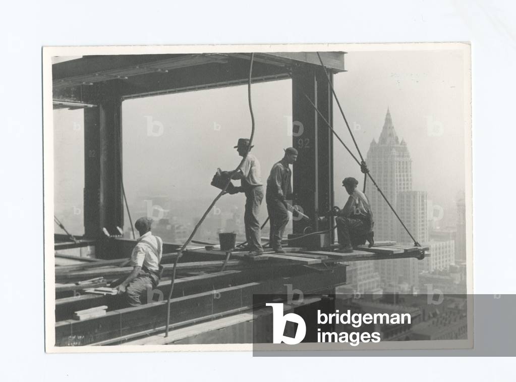 Riveters attaching a beam, Empire State Building, 1931 (gelatin silver print)