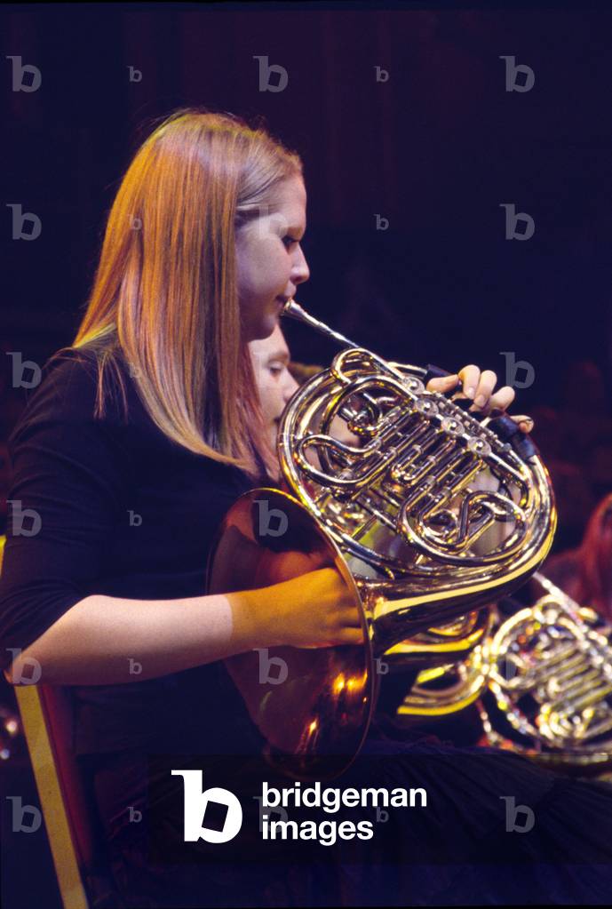 Female French horn player