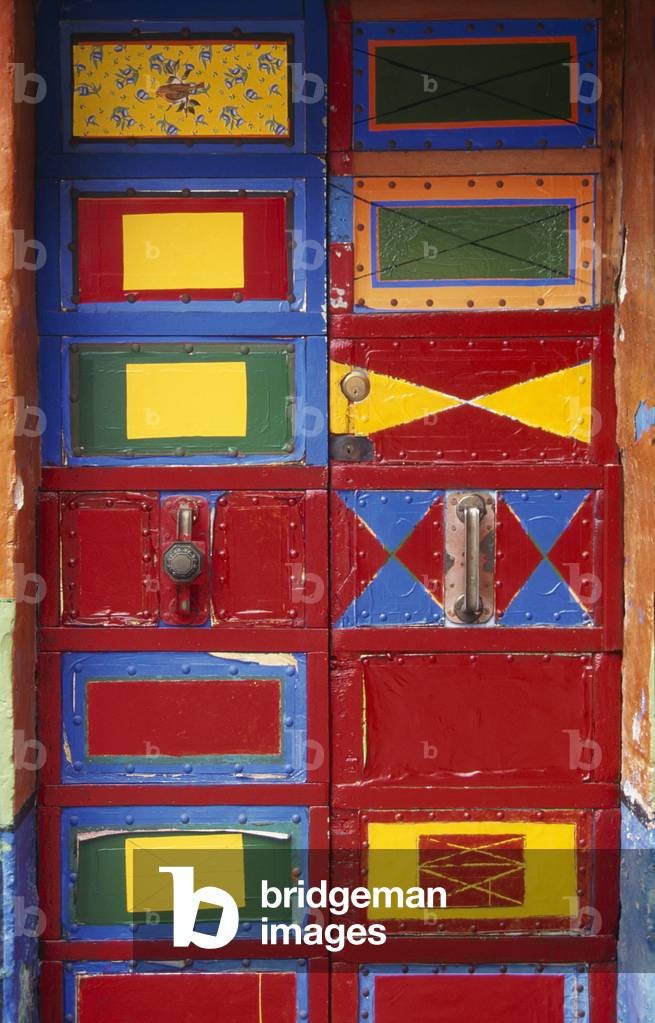 Double entrance door of small house in Burano, Venice, Italy, 1999 (photo).