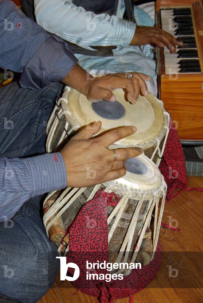 Close-up of tabla player's hands.