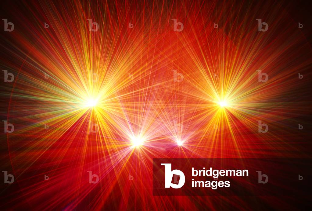 Bursts of red, orange and yellow thin laser beams -