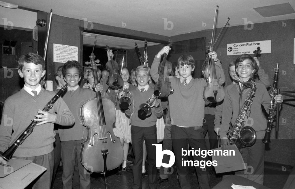 Cheerful young musicians about to go on stage